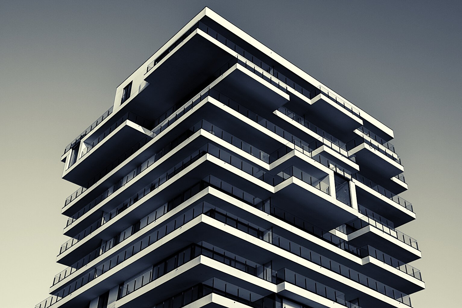 Grayscale Photo of Concrete Building